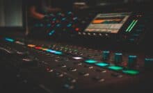 Photo of recording studio mixing board by dylan-mcleod